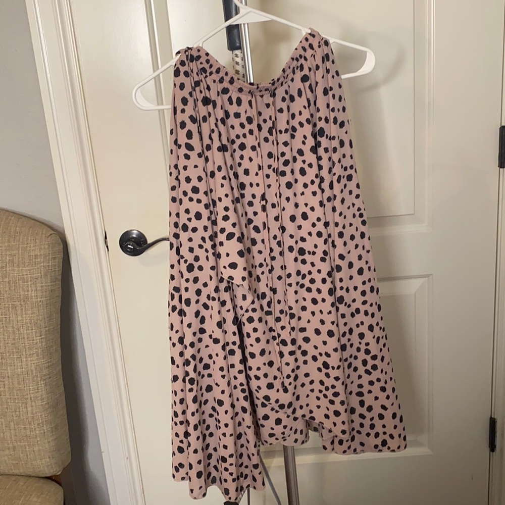 Tan skirt with Black dots, has lining underneath,